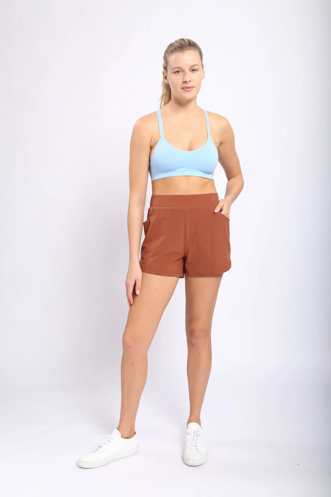 Athleisure shorts with curved hemline