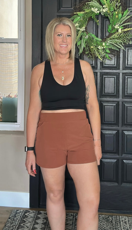 Athleisure shorts with curved hemline